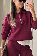 Rhea Red knit polo lounge set featuring a button-placket collared pullover with long sleeves and matching wide-leg pants