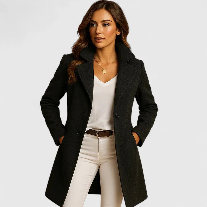 Rheya Black slim-fit longline coat featuring structured lapels, long sleeves, button-front styling, and a tailored silhouette