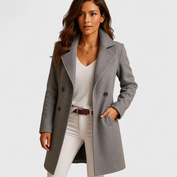 Rheya Gray tailored longline coat with classic notched lapels, front button closure, fitted silhouette, and side pockets