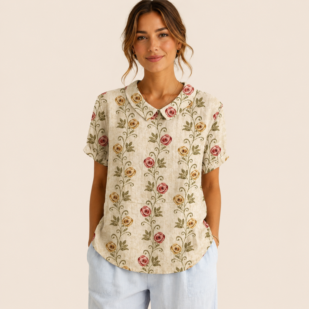 Front view of the Rosalind Blouse Floral-Print Lightweight Collared in beige, featuring a lightweight floral print, collared neckline, and relaxed fit. Designed by Bella Hudson.