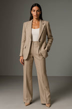 Rowena Beige blazer and high-waisted wide-leg pants set worn with a white top.