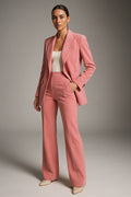 Rowena Pink blazer and wide-leg pants set styled with a white top and nude pointed heels.
