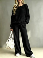 Ruby Black ribbed knit two-piece set with relaxed crewneck sweater and matching wide-leg pants