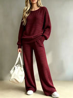 Ruby Red ribbed knit two-piece set with crewneck pullover, long sleeves, and matching wide-leg pants