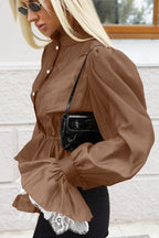 Sabrina Brown blouse side view showing the lantern sleeve, ruffled cuff with lace trim and gathered waist.