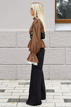 Sabrina Brown blouse full-body side view with black wide-leg pants and a black shoulder bag.