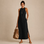 Saffia Lightweight Cotton-Linen Sleeveless Midi Dress in black featuring a sleeveless silhouette, high neckline, decorative lace panel detailing, side pockets, and relaxed midi-length design. Designed by Bella Hudson.