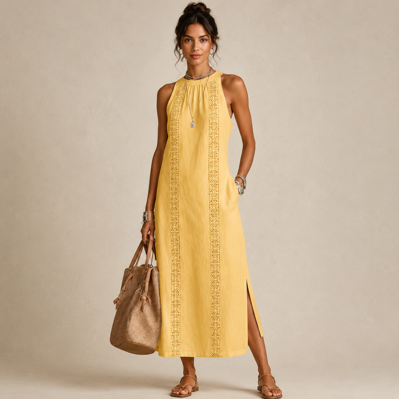 Saffia Lightweight Cotton-Linen Sleeveless Midi Dress in yellow featuring a sleeveless silhouette, high neckline, decorative lace panel detailing, side pockets, and relaxed midi-length design. Designed by Bella Hudson.