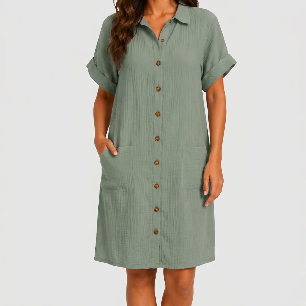 Front view of sage green button front midi dress with short sleeves and side pockets by BELLA HUDSON