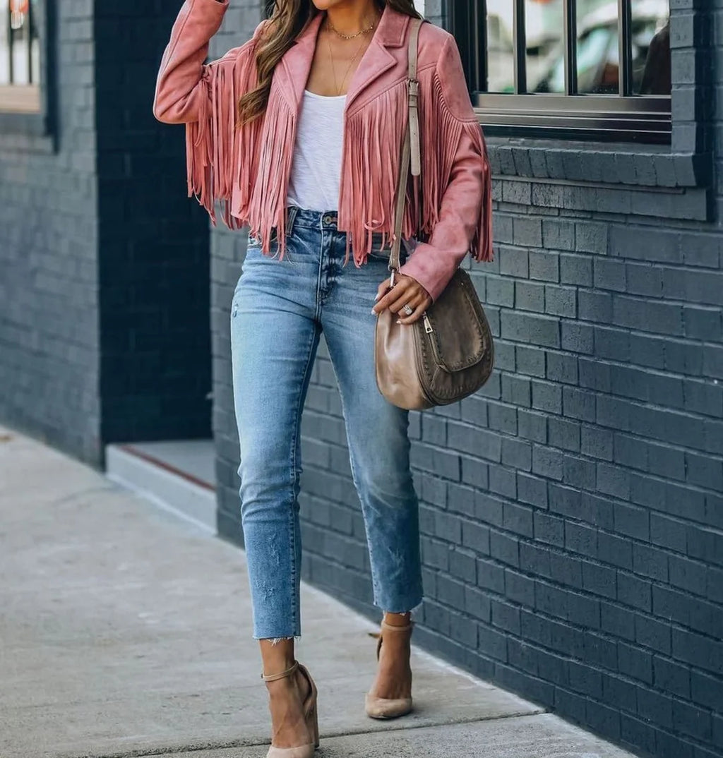 Sienna Pink cropped fringe jacket with a faux-suede finish, classic notched lapels, long sleeves, and cascading fringe detailing