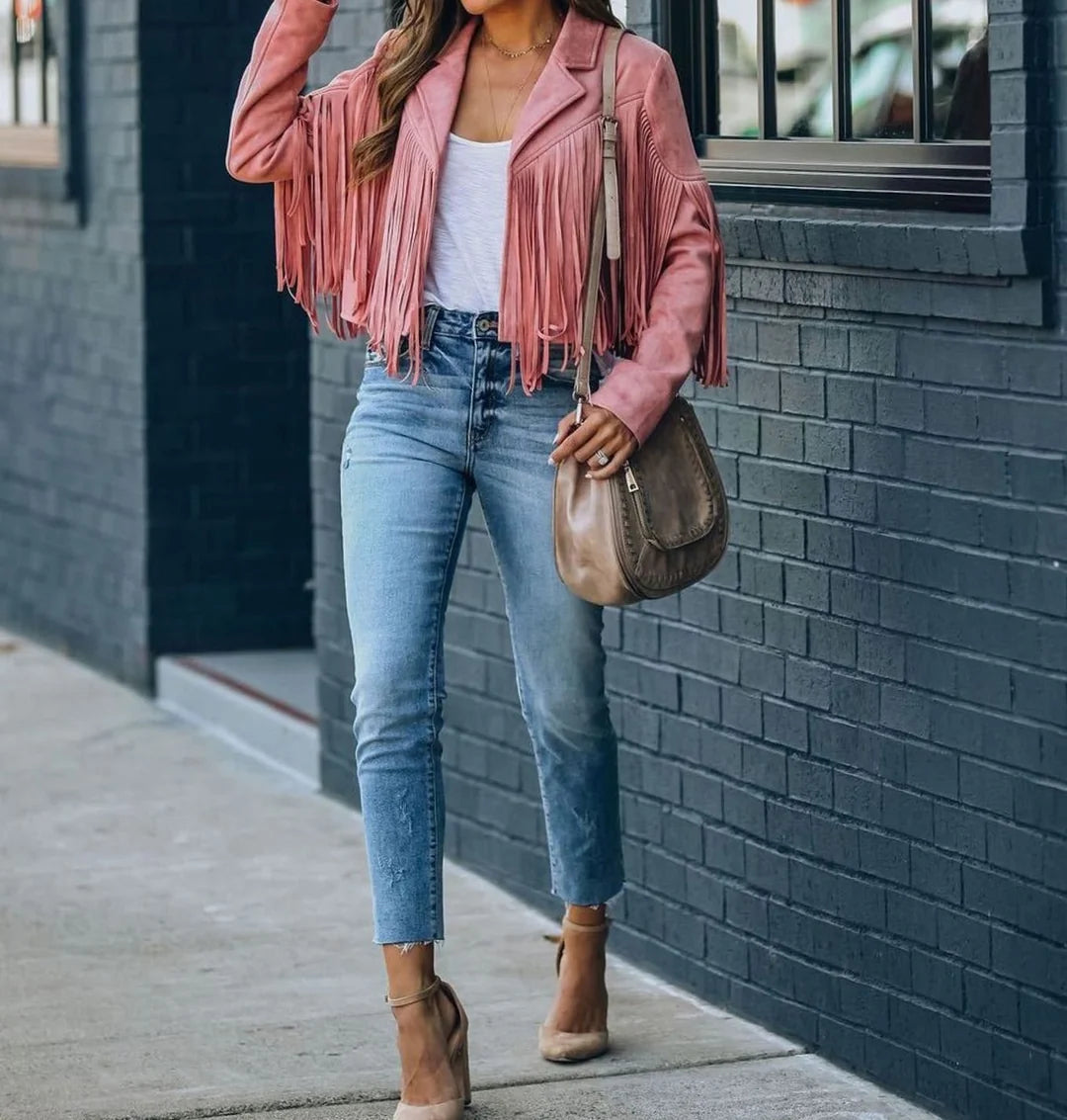 Sienna Pink cropped fringe jacket with a faux-suede finish, classic notched lapels, long sleeves, and cascading fringe detailing