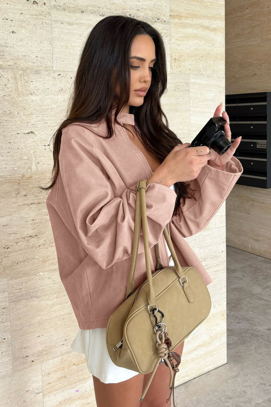 Sienna Pink faux suede bomber jacket with a stand collar, relaxed fit, long sleeves, and zip-front closure