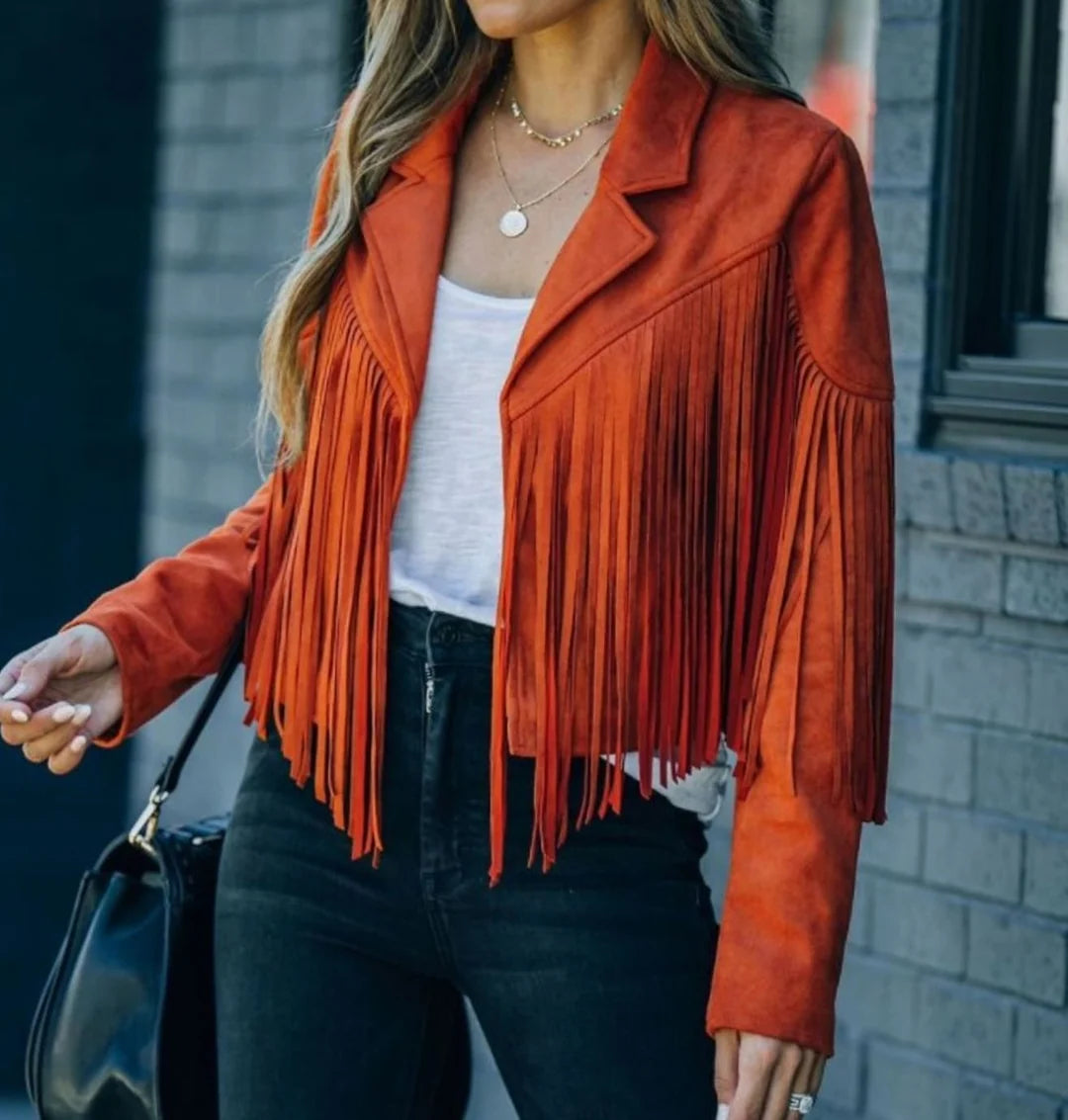 Sienna Red cropped faux-suede moto jacket featuring long cascading fringe, notched lapels, long sleeves, and a Western-inspired design