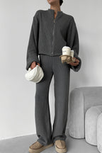 Sloane Gray ribbed knit zip jacket and wide-leg pants set styled full-body with a white bag and coffee cups.