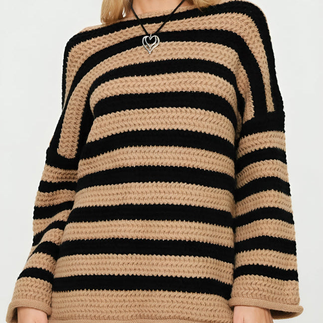 Front view of the Solange Sweater Chunky-Knit Striped in brown, featuring brown and beige horizontal stripes, a round neckline, long sleeves, chunky knit texture, and a relaxed oversized silhouette. Designed by Bella Hudson.