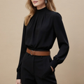 Front view of the Solenne Blouse Stand-Collar Long-Sleeve in Black, featuring a stand collar, button-front design, and long sleeves.