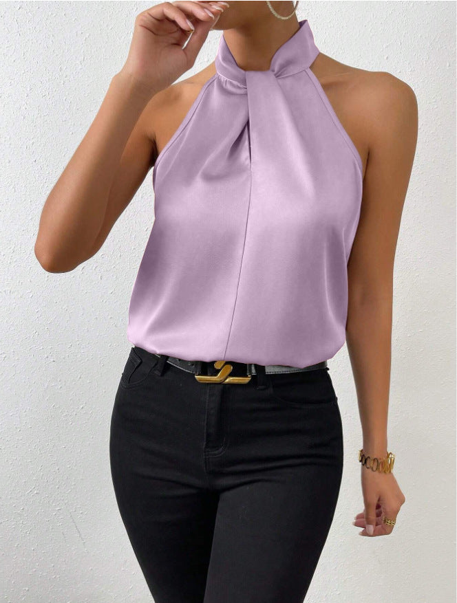 Front view of the Solenne Top Satin Halter Tie-Neck in lilac, featuring a halter tie neckline, sleeveless silhouette, lustrous satin fabric, and an elegant relaxed fit. Designed by Bella Hudson.