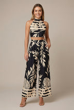 Solenne halter tropical wide-leg two-piece set, Black