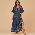 Solveig deep V-neck maxi dress in navy blue, front view, designed by Bella Hudson