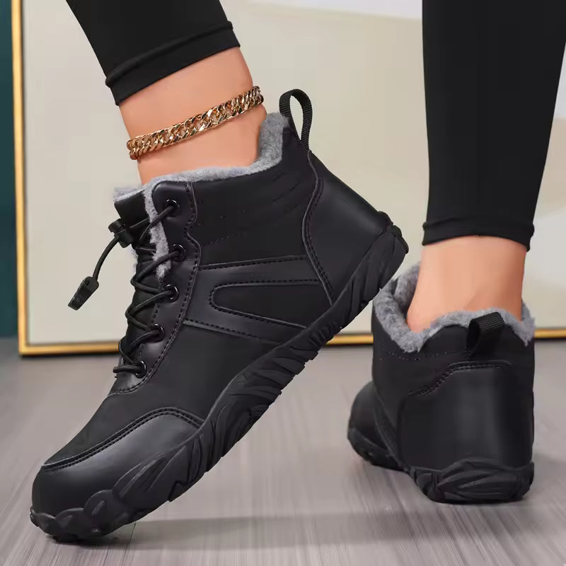 Sophie Black quilted ankle snow boots with lace-up front and plush ankle collar, shown from multiple angles