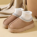 Sophie White ankle slippers with ribbed knit collar, decorative patterned trim, rounded closed toe, and thick platform sole