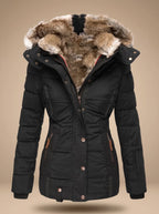 Stella Black quilted winter coat featuring a plush faux-fur-lined hood, adjustable waist, long sleeves, and front pockets
