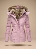 Stella Pink quilted puffer coat featuring an oversized faux-fur-trimmed hood, adjustable waist, long sleeves, and zippered pockets