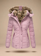 Stella Pink quilted puffer coat featuring an oversized faux-fur-trimmed hood, adjustable waist, long sleeves, and zippered pockets