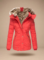 Stella Red quilted puffer coat featuring an oversized faux-fur-trimmed hood, adjustable waist, front closure, and long sleeves
