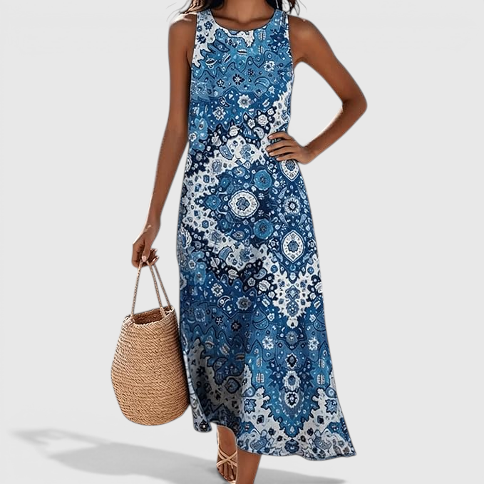 Front view of the Sunniva Midi Dress Sleeveless Bohemian-Print Rustic in blue, featuring a sleeveless round neckline, intricate bohemian print, and a relaxed flowing midi silhouette. Designed by Bella Hudson.