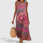 Front view of the Sunniva Midi Dress Sleeveless Bohemian-Print Rustic in dark pink, featuring a sleeveless round neckline, colorful bohemian print, and a relaxed A-line midi silhouette. Designed by Bella Hudson.