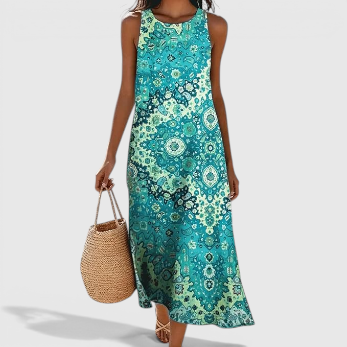 Front view of the Sunniva Midi Dress Sleeveless Bohemian-Print Rustic in turquoise, featuring a sleeveless round neckline, vibrant bohemian-inspired print, and a flowing midi-length silhouette. Designed by Bella Hudson.