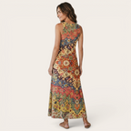 Back view of the Sunniva Midi Dress Sleeveless Bohemian-Print Rustic in yellow, highlighting the sleeveless design, flowing midi silhouette, and intricate all-over bohemian print. Designed by Bella Hudson.
