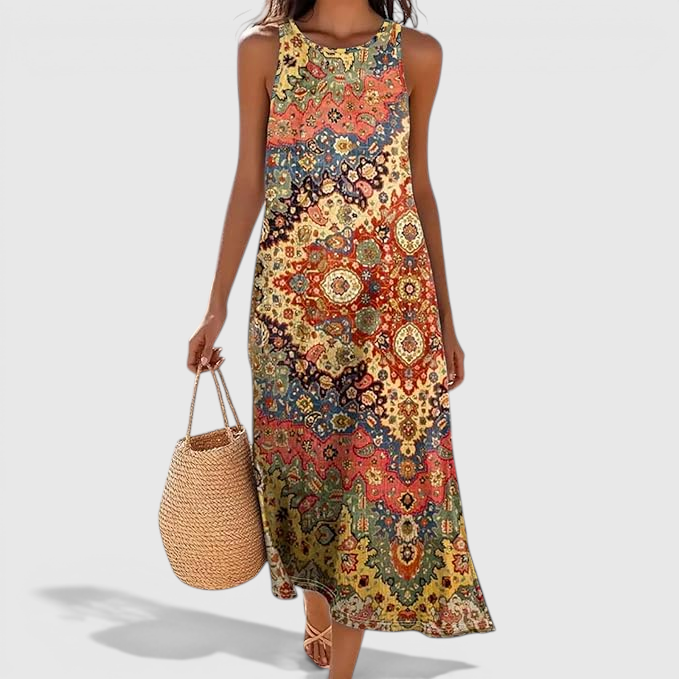 Lifestyle view of the Sunniva Midi Dress Sleeveless Bohemian-Print Rustic in yellow, showcasing the flowing midi silhouette, vibrant bohemian print, and relaxed everyday styling. Designed by Bella Hudson.