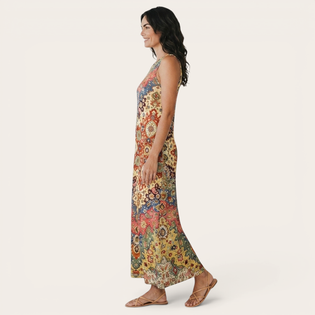 Side view of the Sunniva Midi Dress Sleeveless Bohemian-Print Rustic in yellow, showcasing the sleeveless cut, relaxed silhouette, and colorful bohemian print. Designed by Bella Hudson.