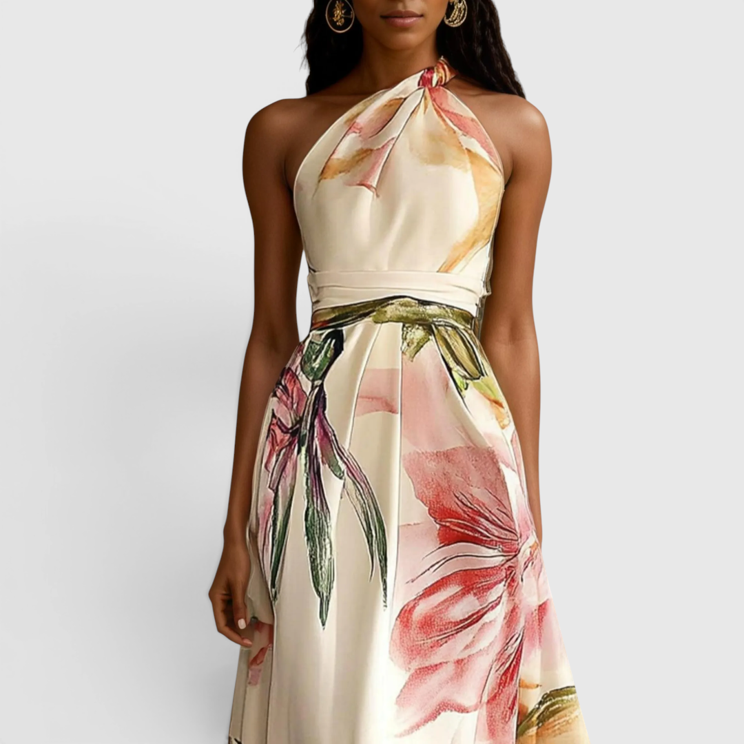 Close-up detail of the Talia Maxi Dress Floral-Print Satin with Halter Neck in pink, featuring the halter neckline, satin fabric, and oversized floral print. Designed by Bella Hudson.