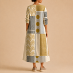 Tessa Lightweight Patchwork Linen Midi Dress, back view featuring the flowing midi silhouette and contemporary patchwork design. Designed by Bella Hudson.