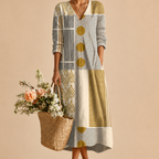 Close-up of the Tessa Lightweight Patchwork Linen Midi Dress showcasing the patchwork details, premium lightweight linen fabric, and elegant craftsmanship. Designed by Bella Hudson.