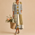 Tessa Lightweight Patchwork Linen Midi Dress, front view highlighting the artistic patchwork print, relaxed fit, and breathable linen fabric. Designed by Bella Hudson.