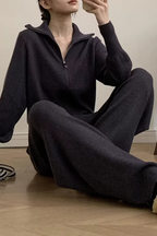 Tessa ribbed knit lounge set shown seated with a full-zip cardigan, relaxed silhouette, and matching wide-leg pants