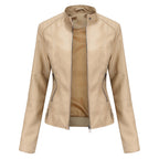 Front view of the Théodine Jacket Faux-Leather Stand-Collar in beige, featuring a structured stand collar, zip-front closure, long sleeves, and a sleek fitted silhouette. Designed by Bella Hudson.