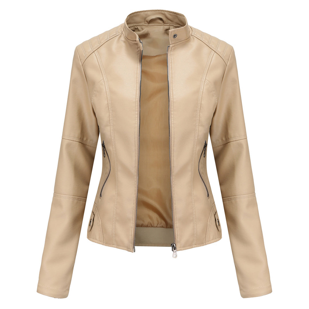 Front view of the Théodine Jacket Faux-Leather Stand-Collar in beige, featuring a structured stand collar, zip-front closure, long sleeves, and a sleek fitted silhouette. Designed by Bella Hudson.