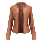 Front view of the Théodine Jacket Faux-Leather Stand-Collar in light brown, featuring a structured stand collar, zip-front closure, long sleeves, and a fitted faux-leather silhouette. Designed by Bella Hudson.