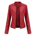 Front view of the Théodine Jacket Faux-Leather Stand-Collar in red, featuring a structured stand collar, zip-front closure, long sleeves, fitted silhouette, and smooth faux-leather finish. Designed by Bella Hudson.