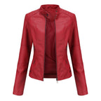 Front view of the Théodine Jacket Faux-Leather Stand-Collar in red, featuring a structured stand collar, zip-front closure, long sleeves, fitted silhouette, and smooth faux-leather finish. Designed by Bella Hudson.