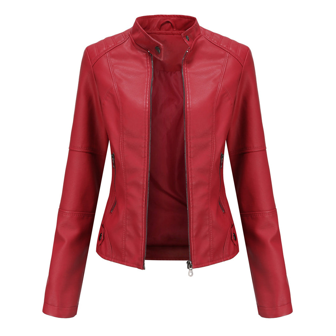 Front view of the Théodine Jacket Faux-Leather Stand-Collar in red, featuring a structured stand collar, zip-front closure, long sleeves, fitted silhouette, and smooth faux-leather finish. Designed by Bella Hudson.