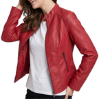Lifestyle view of the Théodine Jacket Faux-Leather Stand-Collar in red, featuring the structured stand collar, long sleeves, zip-front design, and fitted faux-leather silhouette. Designed by Bella Hudson.