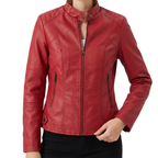 Front model view of the Théodine Jacket Faux-Leather Stand-Collar in red, showcasing the stand collar, zip-front closure, fitted waist, and sleek faux-leather construction. Designed by Bella Hudson.