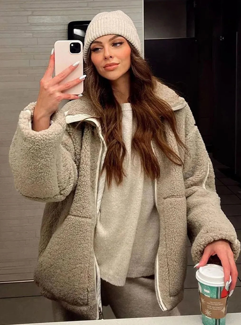 Victoria Beige teddy fleece jacket featuring a plush textured exterior, high collar, full front zipper, relaxed fit, and long sleeves