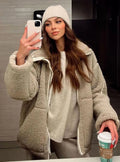 Victoria Beige teddy fleece jacket featuring a plush textured exterior, high collar, full front zipper, relaxed fit, and long sleeves